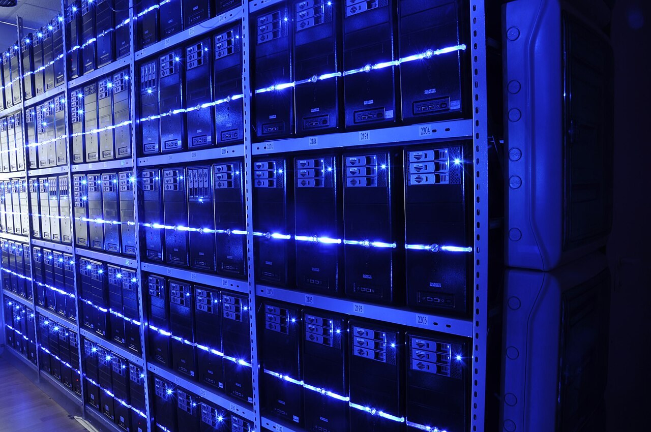 Rows of network equipment in a data hall